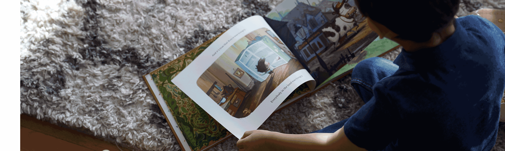 Child reading on floor