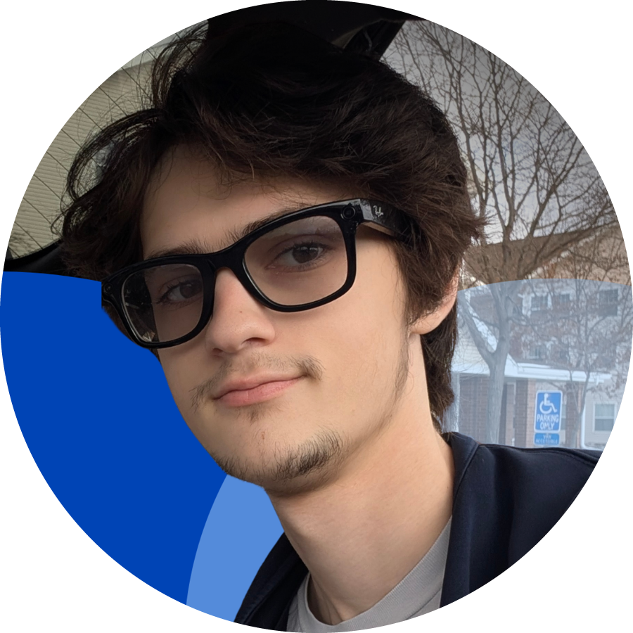 Teenage boy with glasses, blue graphics