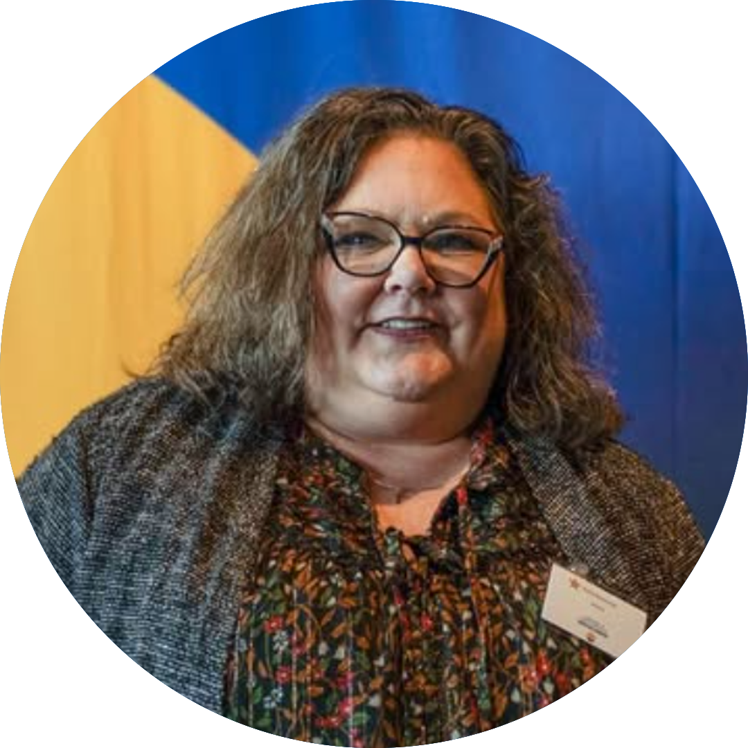 Woman with glasses smiling