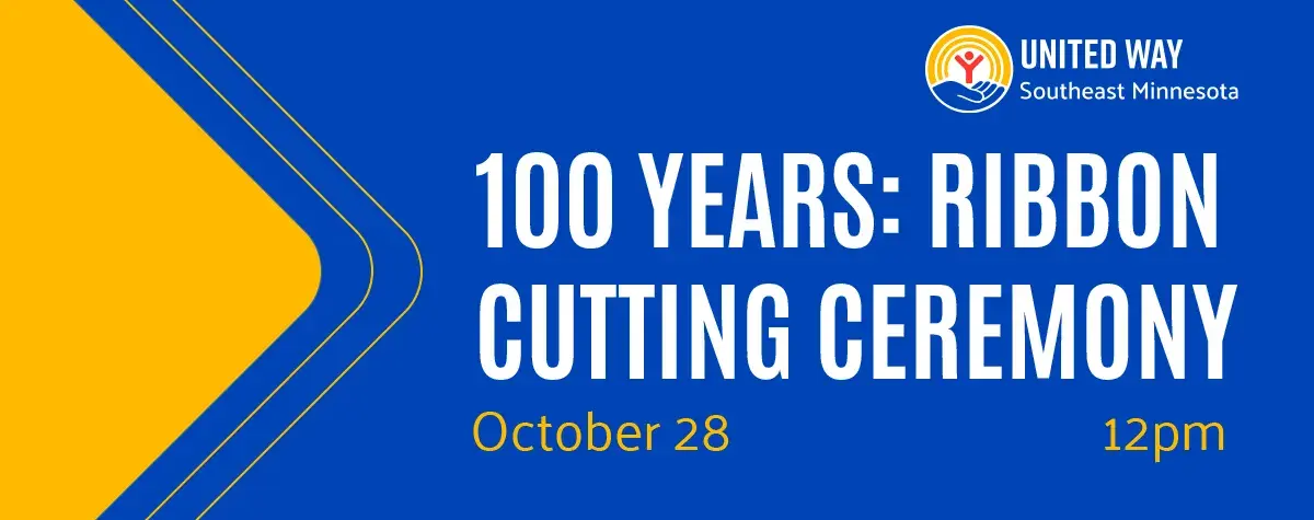 Blue banner with text that reads 100 Years: Ribbon Cutting Ceremony.