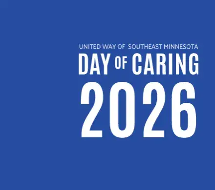 Blue graphic with text that reads Day of Caring 2026