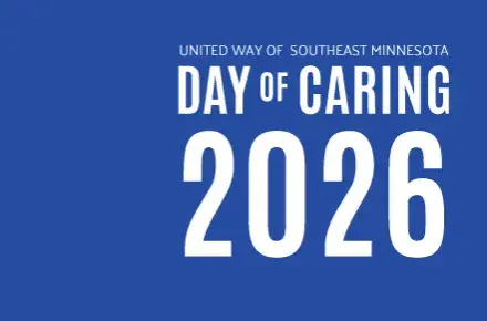 Blue graphic with text that reads Day of Caring 2026